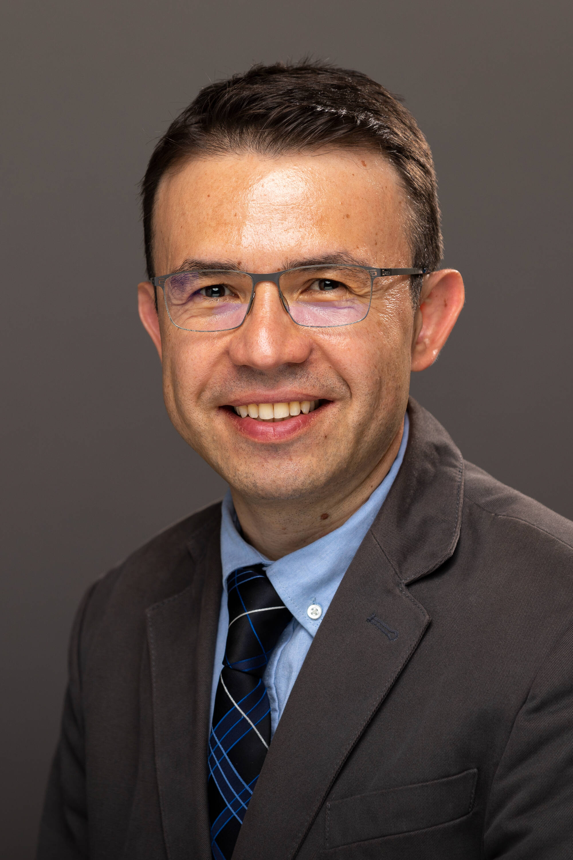 Studio portrait of Atilla Cakmak.